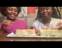 Two women eats cake with mold for challenge