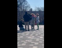 Two ladies in costume films at park