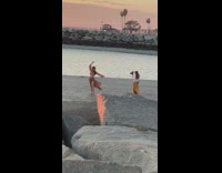 Woman beige beach dress windy photo shoot Part 1