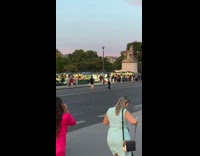 Woman walk spin middle of road Eiffel tower