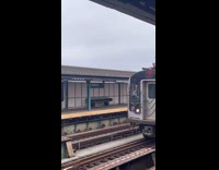 Woman sitting on top of moving train