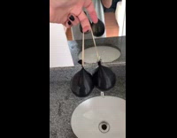 Person fills up water into balloons 