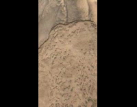 Sand dunes touched and slowly falls apart