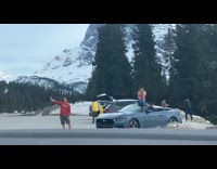 Woman denim jumper poses in convertible car Part 2