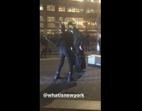 2 guys dance in black costumes 