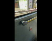 Rainwater flows on the bus window that produced waves