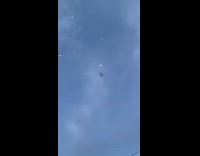 Third firework explodes on grass backyard guy