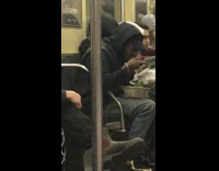 Guy pulls out big bowl of salad and starts eating it on subway