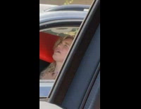 Blonde lady stuck in traffic yells for Jesus 