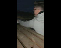 Group of friends drink on a pickup truck 