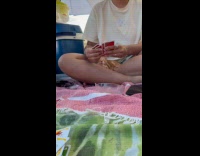 Kitten sleep on lap of woman play UNO