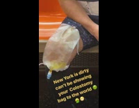 Blue shirt guy colostomy bag subway train 