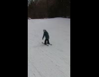 7 year old jumping off ski ramp
