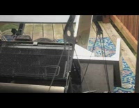 Plastic playhouses and tumbled down grill balcony