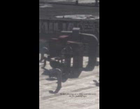 Man playing drums on barbeque grill 