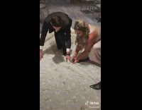 Bride cuts her wedding dress train 