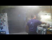 Fire erupts while man cooking in kitchen 
