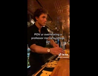 Guy black shirt bartender cutting lemons