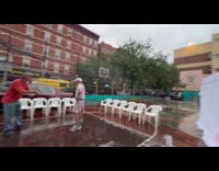 Collab WINY - Man red shirt act at parking lot rain