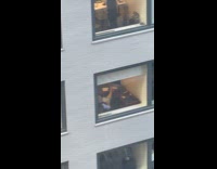 Man works with both feet on desk