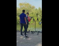 Guy bird on hand blue shirt startled