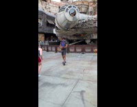 Guy at Star Wars land does handstand with lightsaber 