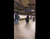 Guy white costume mask striped cane subway