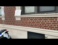 Collab WINY - Notes on wall near motorcycle getting fixed