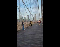 Collab WINY - Man playing tuba with fire bridge