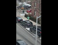 Person wearing statue of liberty costume outside