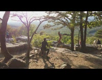 Woman air plank head on guy shoulders