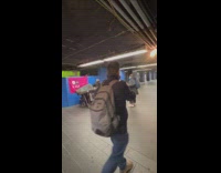 Elderly Lady Dances to Busker as he  Plays Guitar