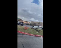 Tornado aftermath leaves trees and upside down cars