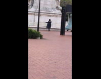 Collab IITW - Woman in a black coat tiktok dance at the park