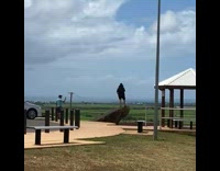 Woman black shirt hat stand rock gazebo