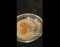 Woman cooking eggs making weird sound 