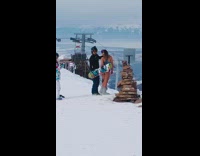 Girl wears sports bra in snow 