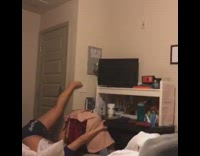 Girl turn off light switch using feet