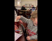 Young boy dip finger and taste beer