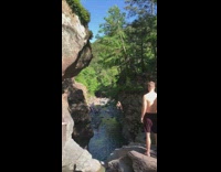 Grandpa jumps from tall tree to water 