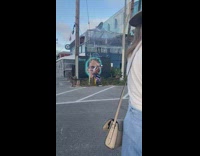 Man shirtless man boom box photo shoot graffiti wall