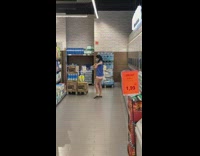 Woman blue shirt face mask dance grocery