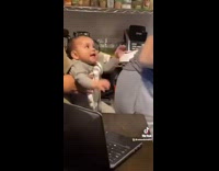 Girl shakes butt in front of baby 