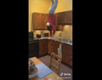 Guy handstand kitchen floating backflip ceiling