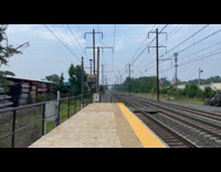 Man Waits and Watch Train Pass by