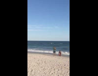 Man orange underwear muscle abs photo shoot beach