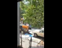 Man play piano on pickup truck bed