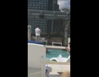 Girl sit chair outdoor pool white shirt