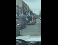 Guy blasts music sings back of car