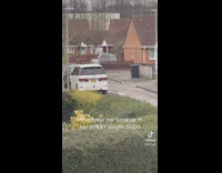 Girl pulls up to friends house in single person small car 